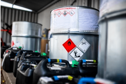Containers containing hazardous chemical corrosive liquids
